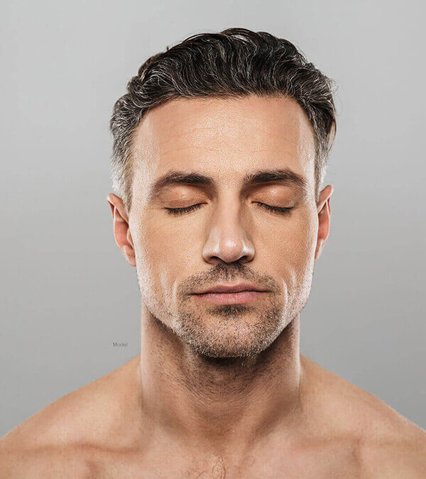 Handsome man with his eyes closed