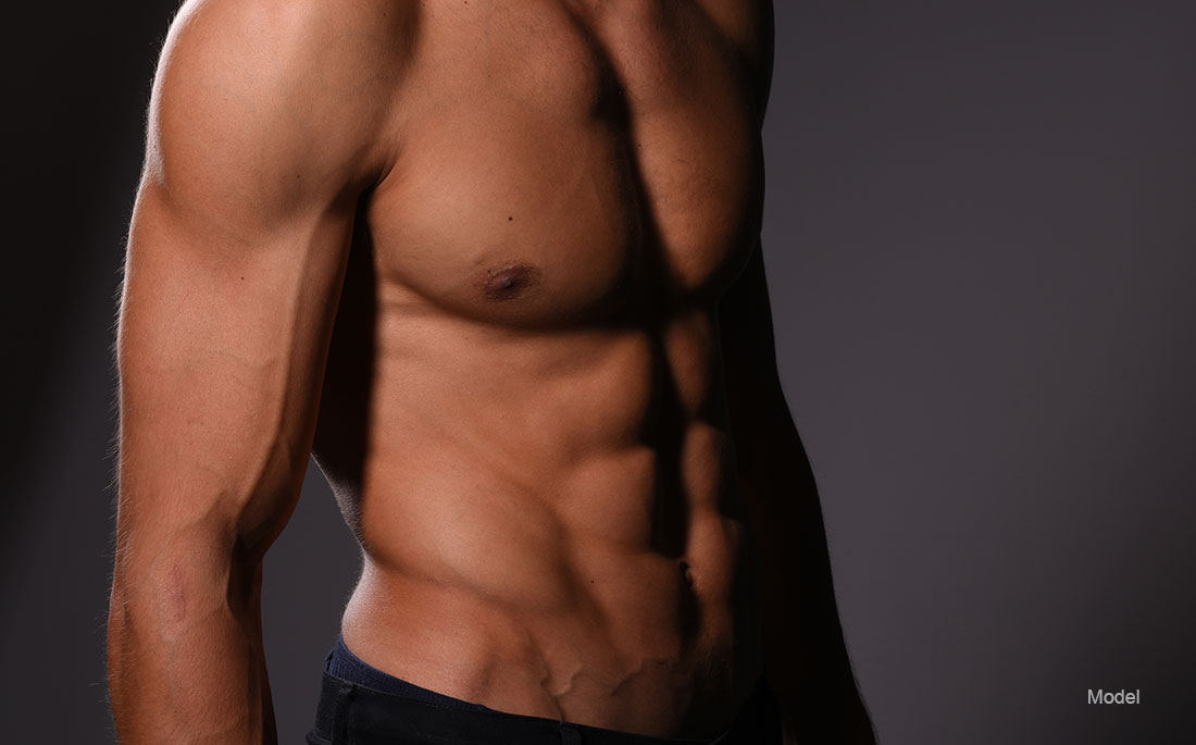 Fit shirtless man with